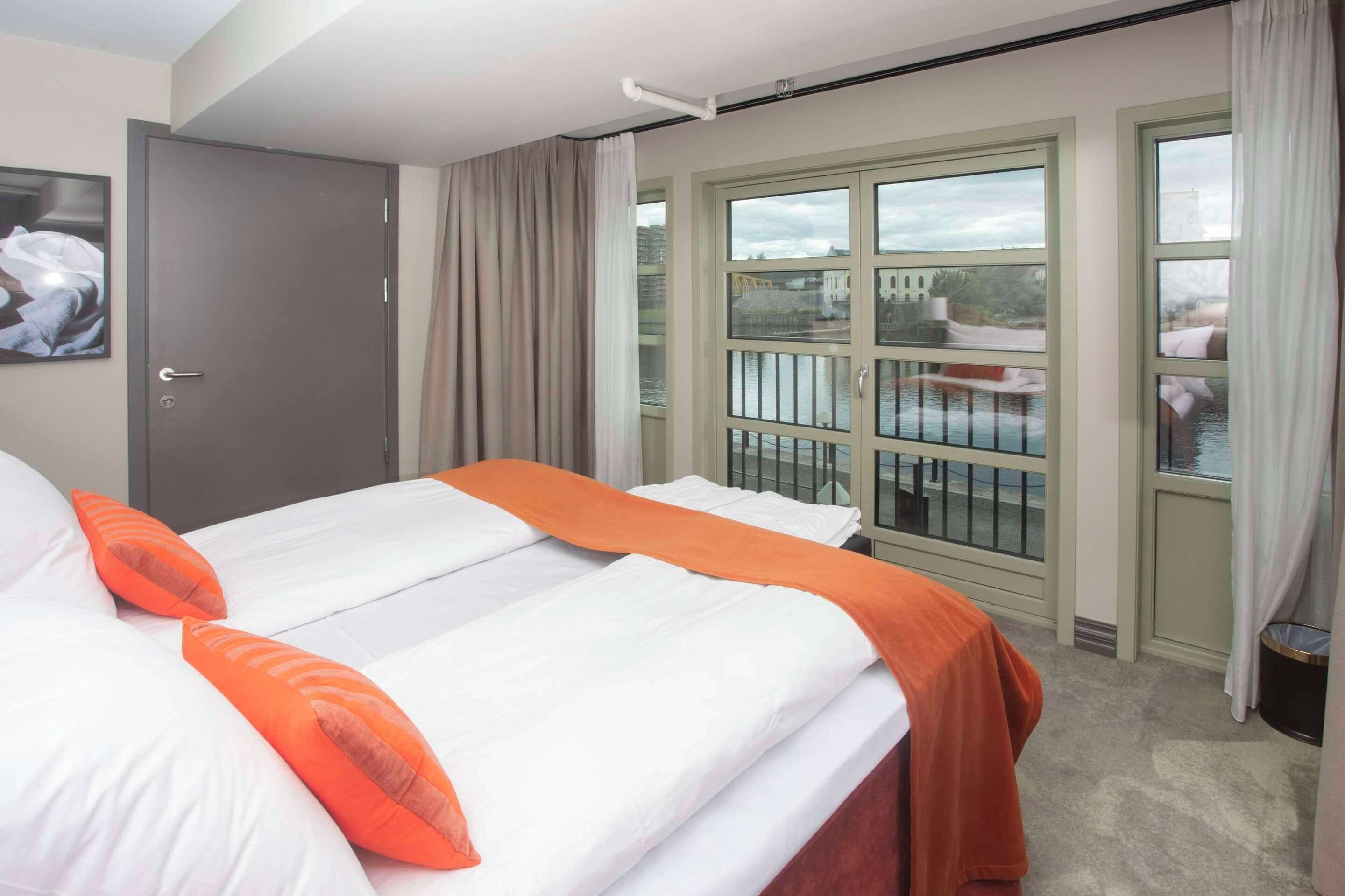 deluxe double room, 1 double bed | 1 bedroom, blackout curtains, iron/ironing board, bed sheets