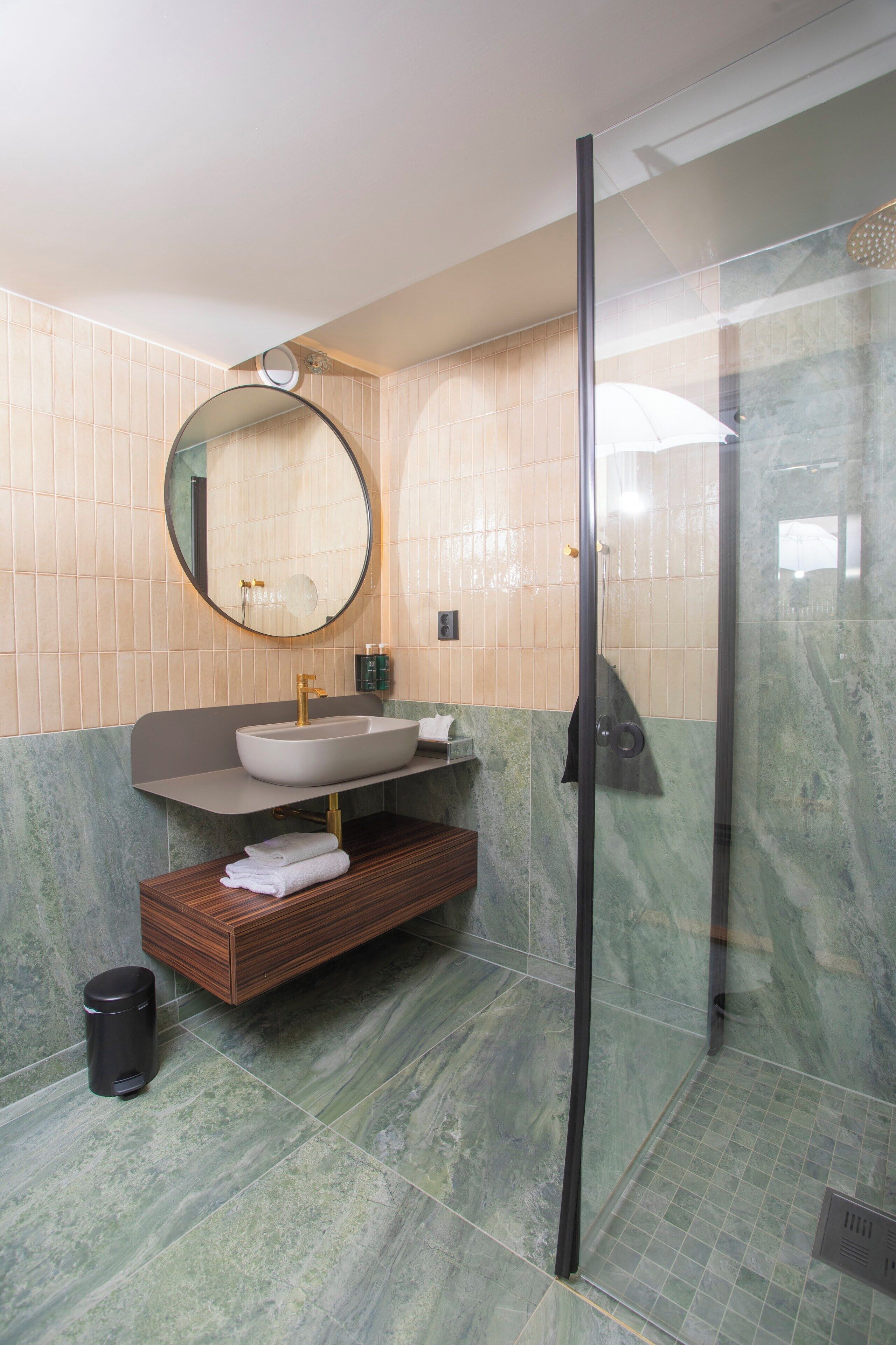 deep-soaking bathtub, hair dryer, heated floors, towels