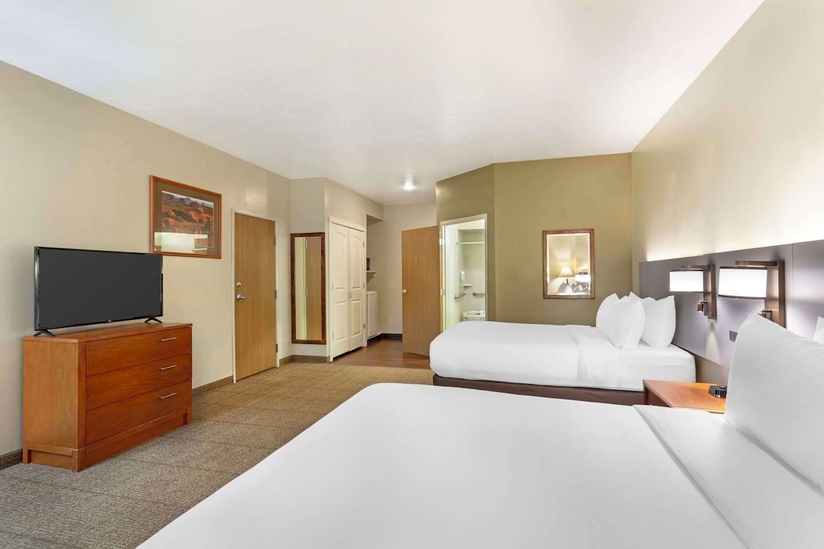 room, 2 queen beds, accessible, non smoking | desk, laptop workspace, iron/ironing board, rollaway beds