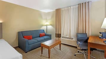 Larger Room, 2 Queen Beds, Non-Smoking | Desk, laptop workspace, iron/ironing board, rollaway beds