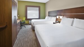 A hotel room with two beds, a desk, a chair, and a window with blinds. - Holiday Inn Express & Suites Manchester by IHG (Manchester)