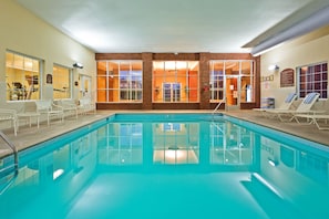 Indoor pool, open 6:00 AM to 11 PM, pool loungers