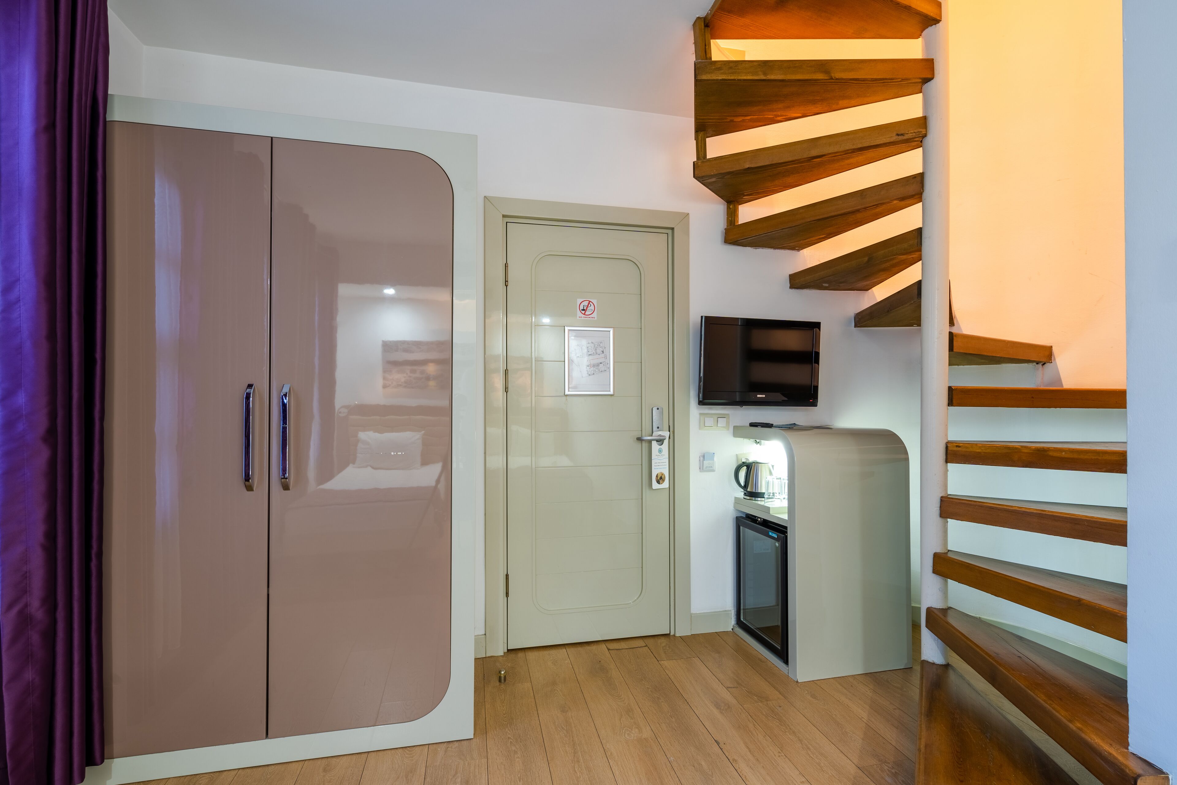 family room | premium bedding, minibar, in-room safe, desk