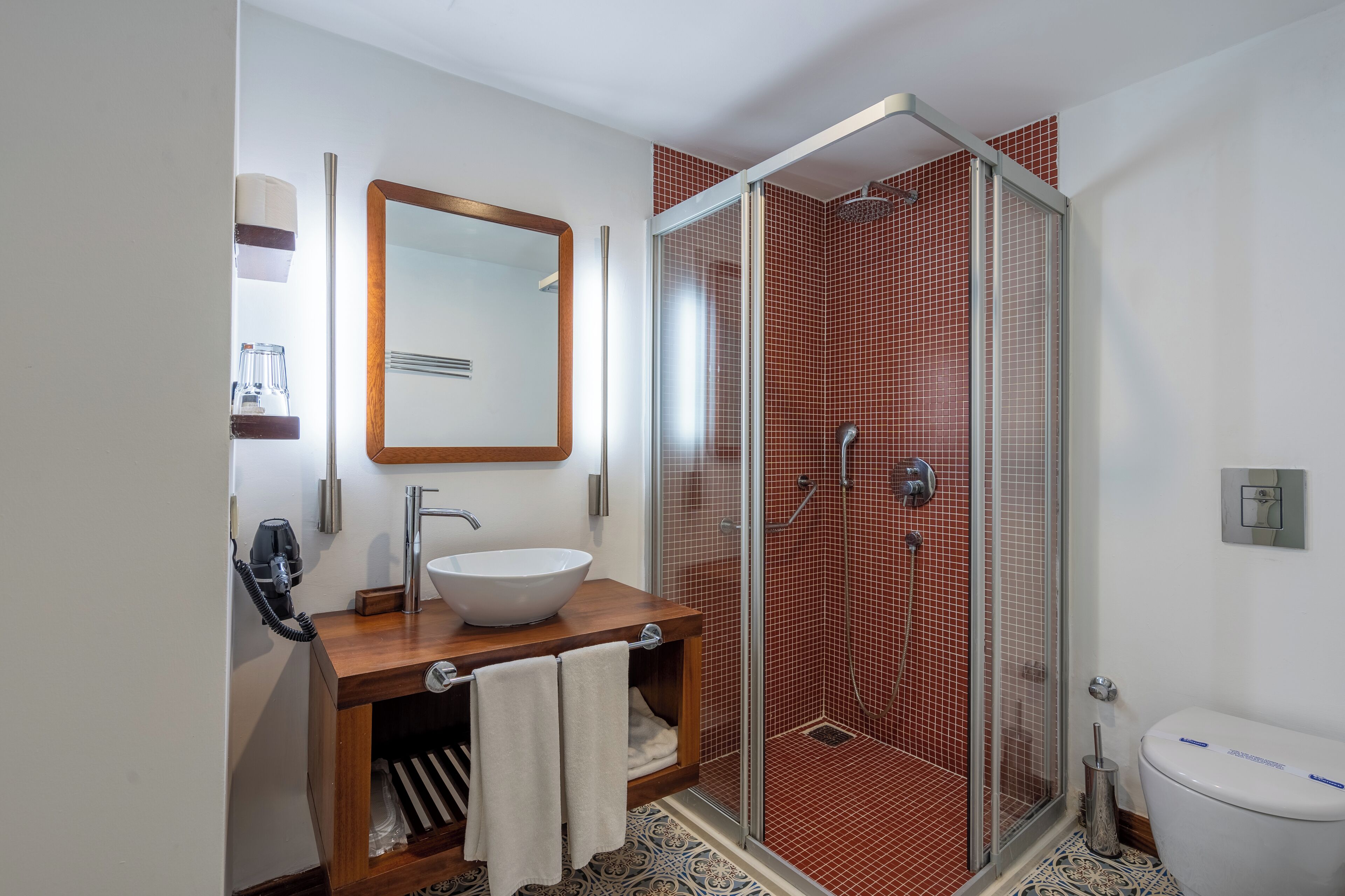 shower, free toiletries, hair dryer, slippers