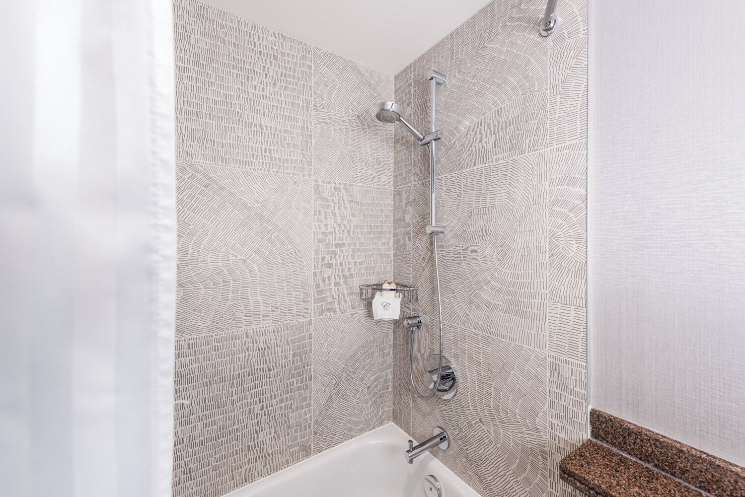 standard 2-bedroom suite (1 king + 2 twins) | bathroom | combined shower/bathtub, free toiletries, hair dryer, towels