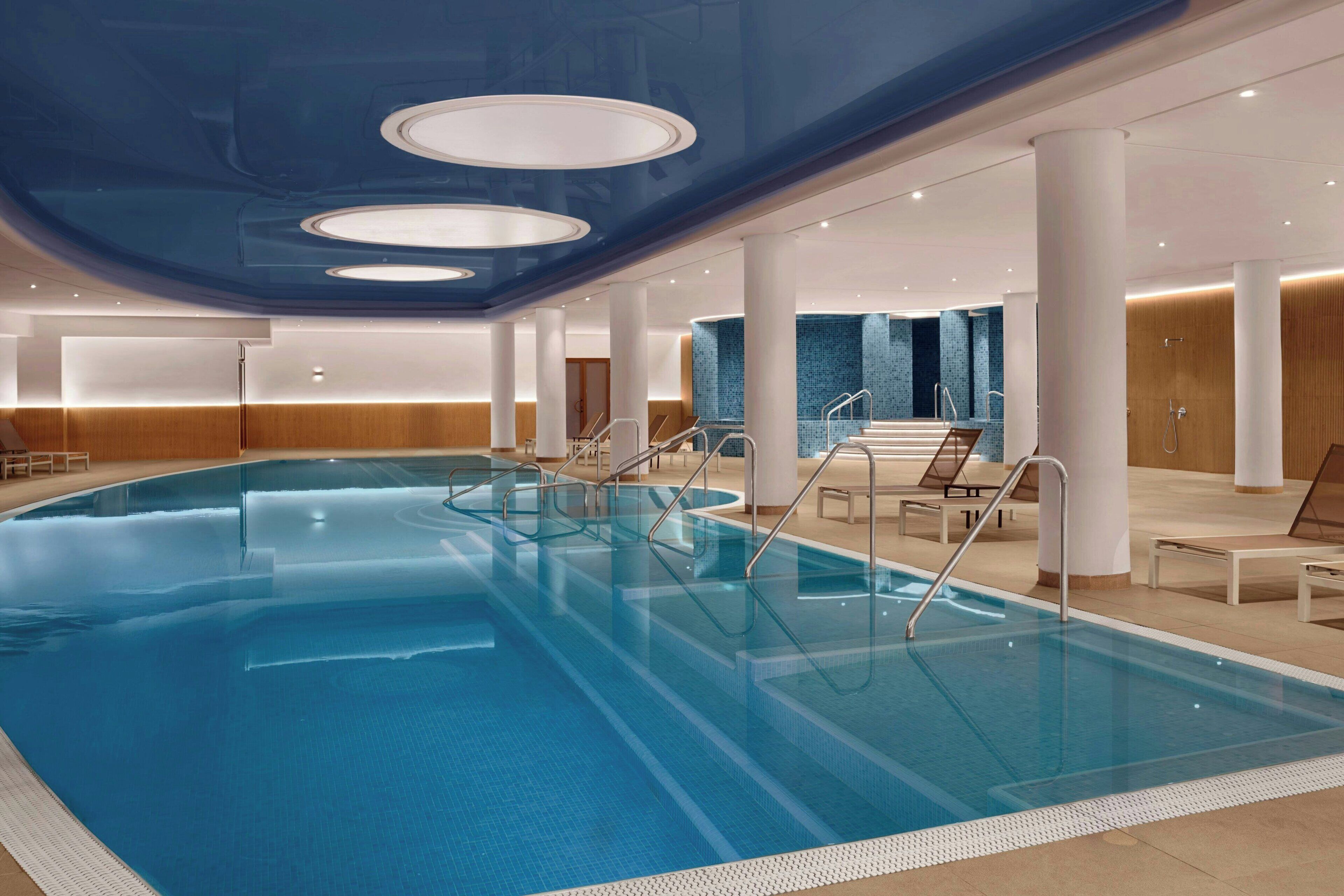 Indoor pool, outdoor pool, pool umbrellas, sun loungers