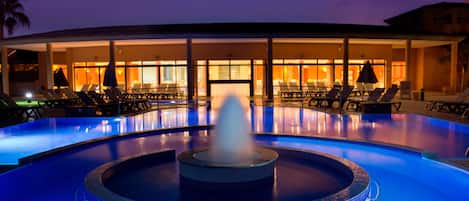 Indoor pool, outdoor pool, pool umbrellas, pool loungers