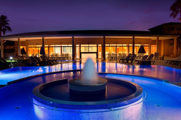 Indoor pool, outdoor pool, pool umbrellas, sun loungers