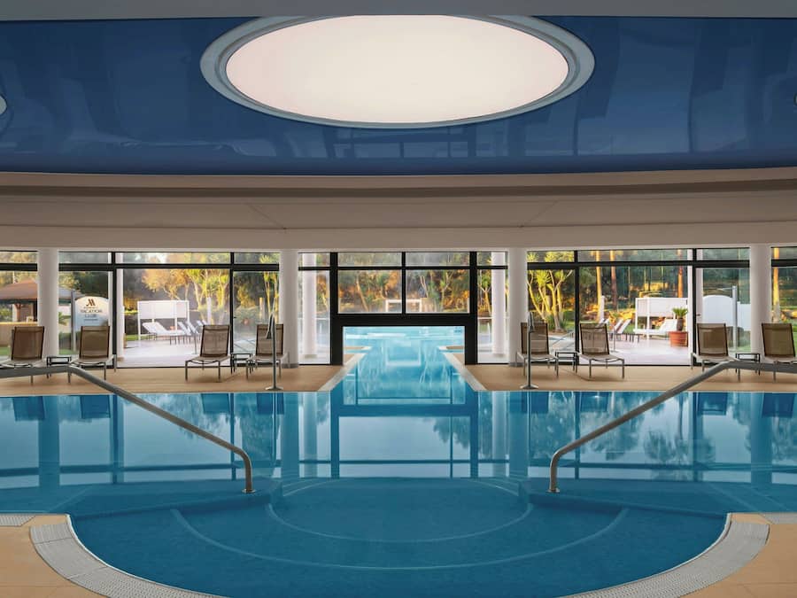 Indoor pool, outdoor pool, pool umbrellas, sun loungers
