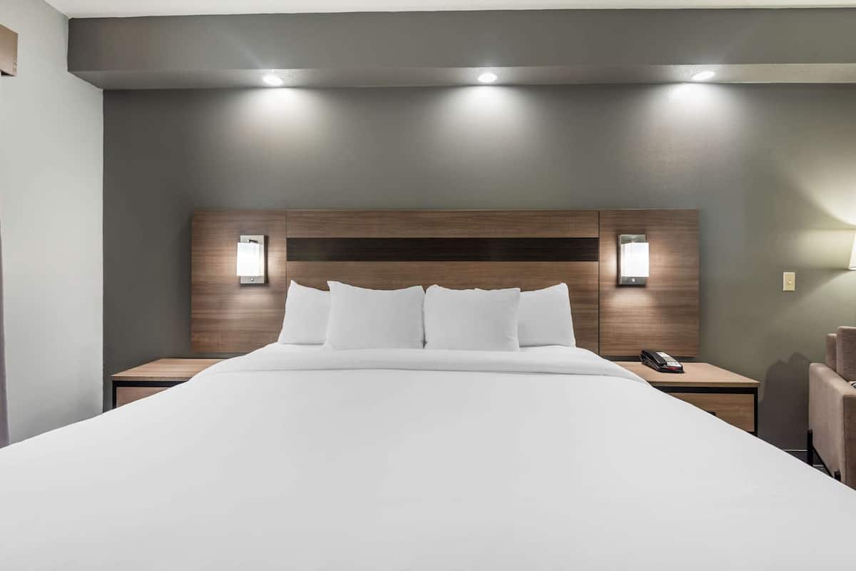 Premium bedding, desk, blackout drapes, iron/ironing board