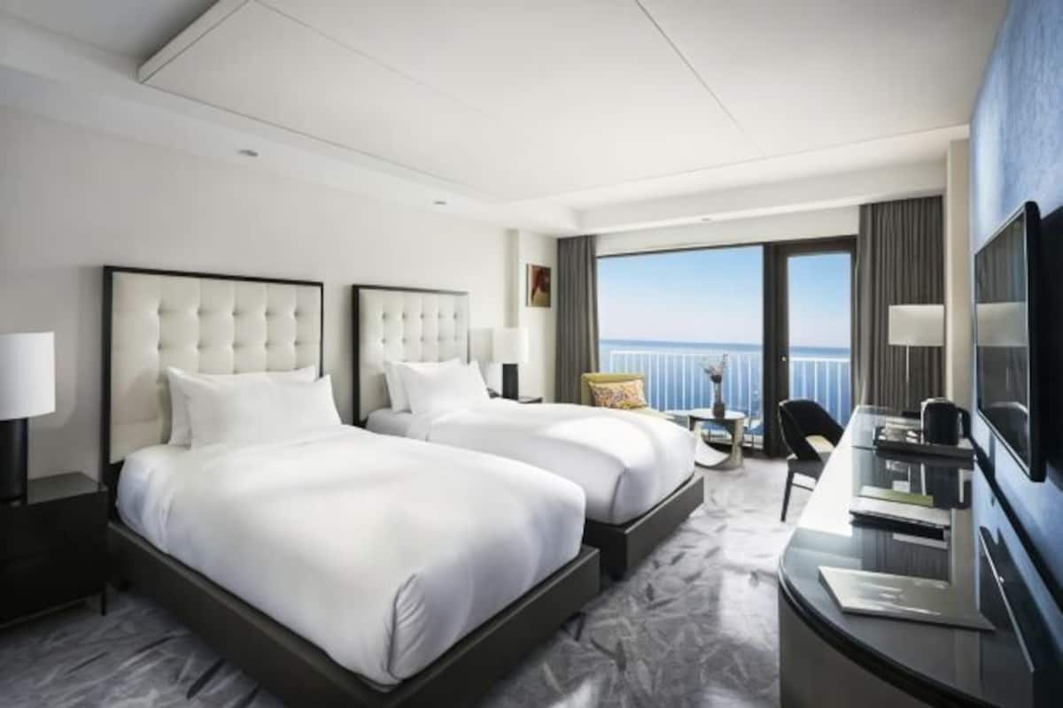 Premium bedding, down duvets, minibar, in-room safe