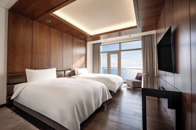 Premium bedding, down duvets, minibar, in-room safe