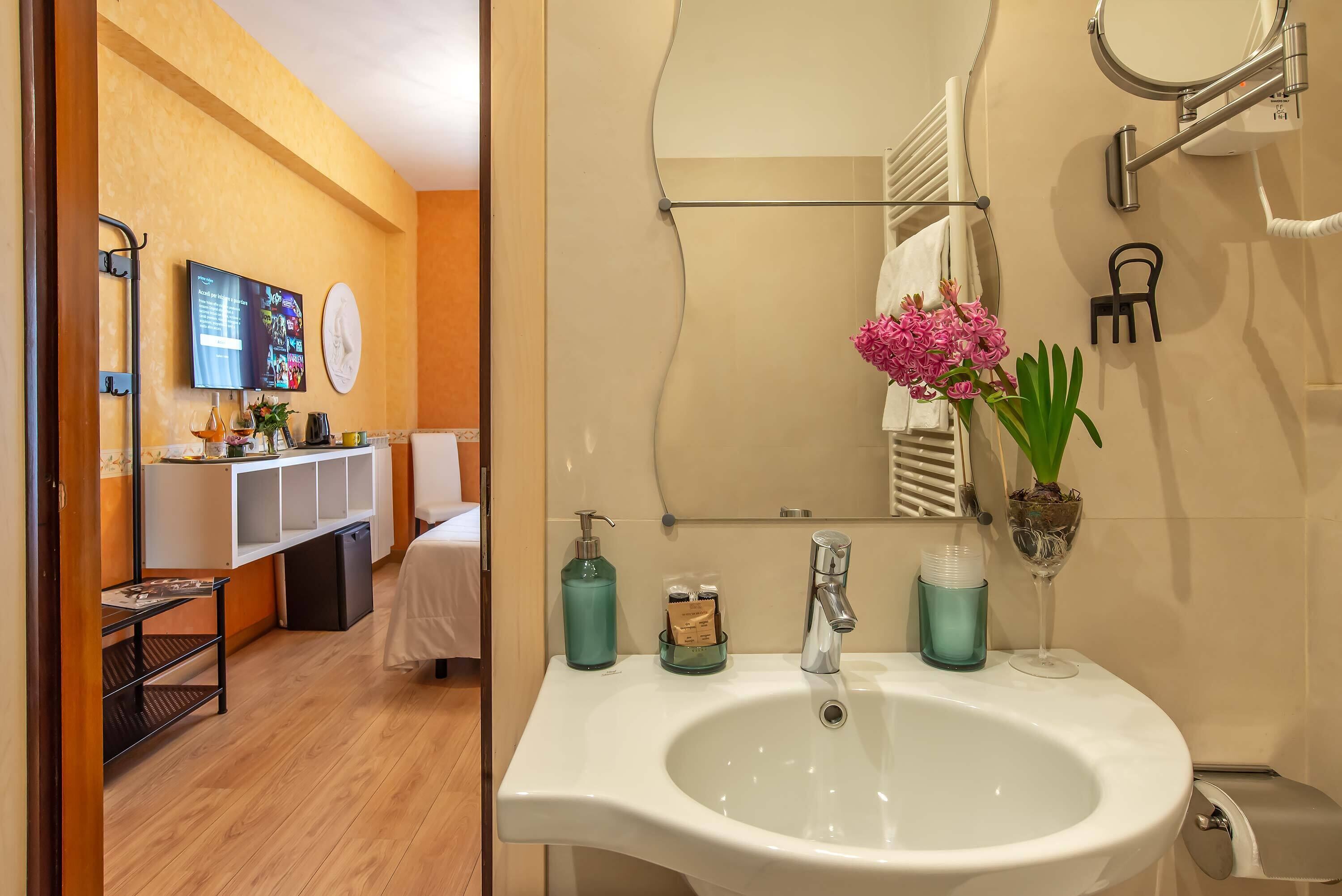 standard double or twin room | bathroom | shower, hair dryer, towels