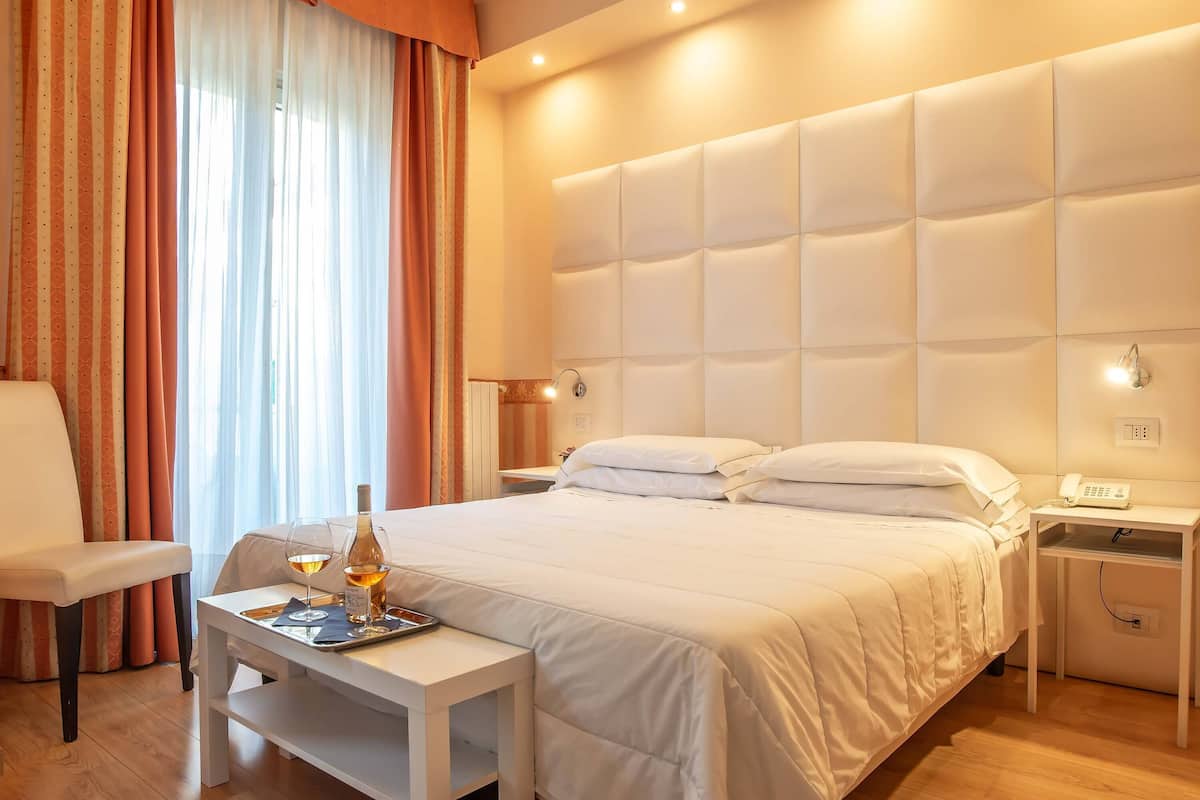 Triple Room | Hypo-allergenic bedding, minibar, in-room safe, desk
