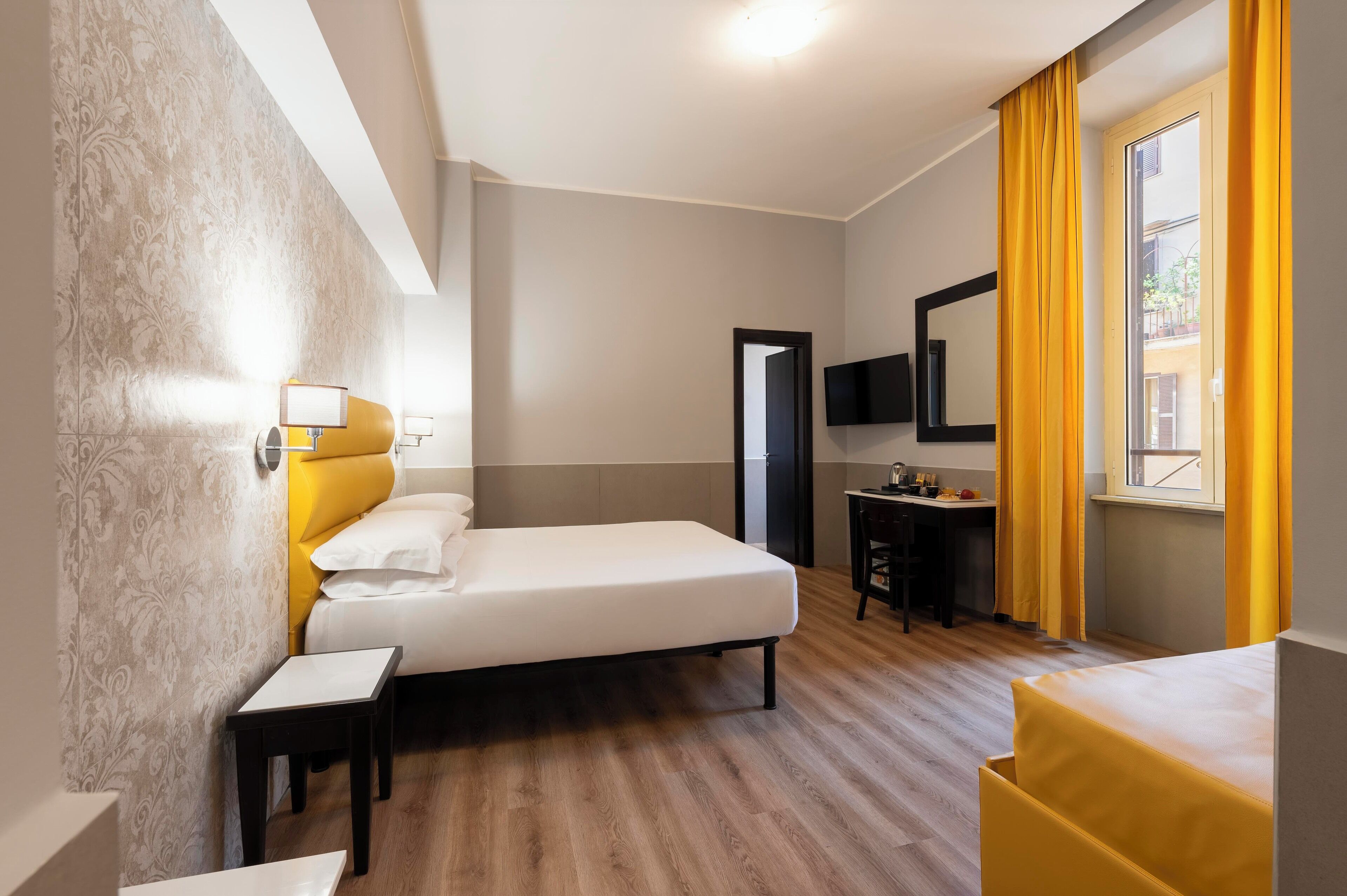 family room | 2 bedrooms, minibar, in-room safe, desk