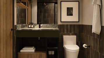 Une salle de bain moderne avec un meuble-lavabo en bois, des toilettes et un tableau encadré au mur.