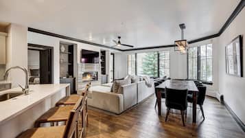 Premium Condo, 2 Bedrooms | Living area | Flat-screen TV, fireplace