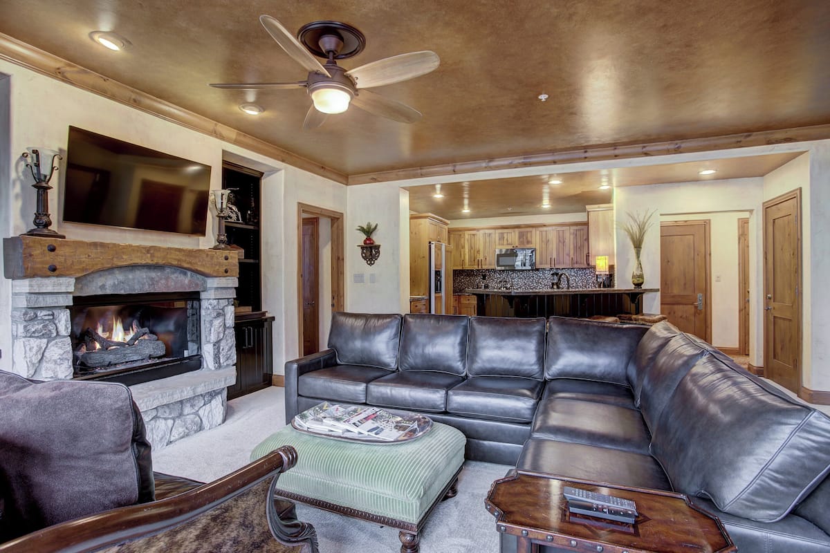 Premium Condo, 2 Bedrooms | Living area | Flat-screen TV, fireplace