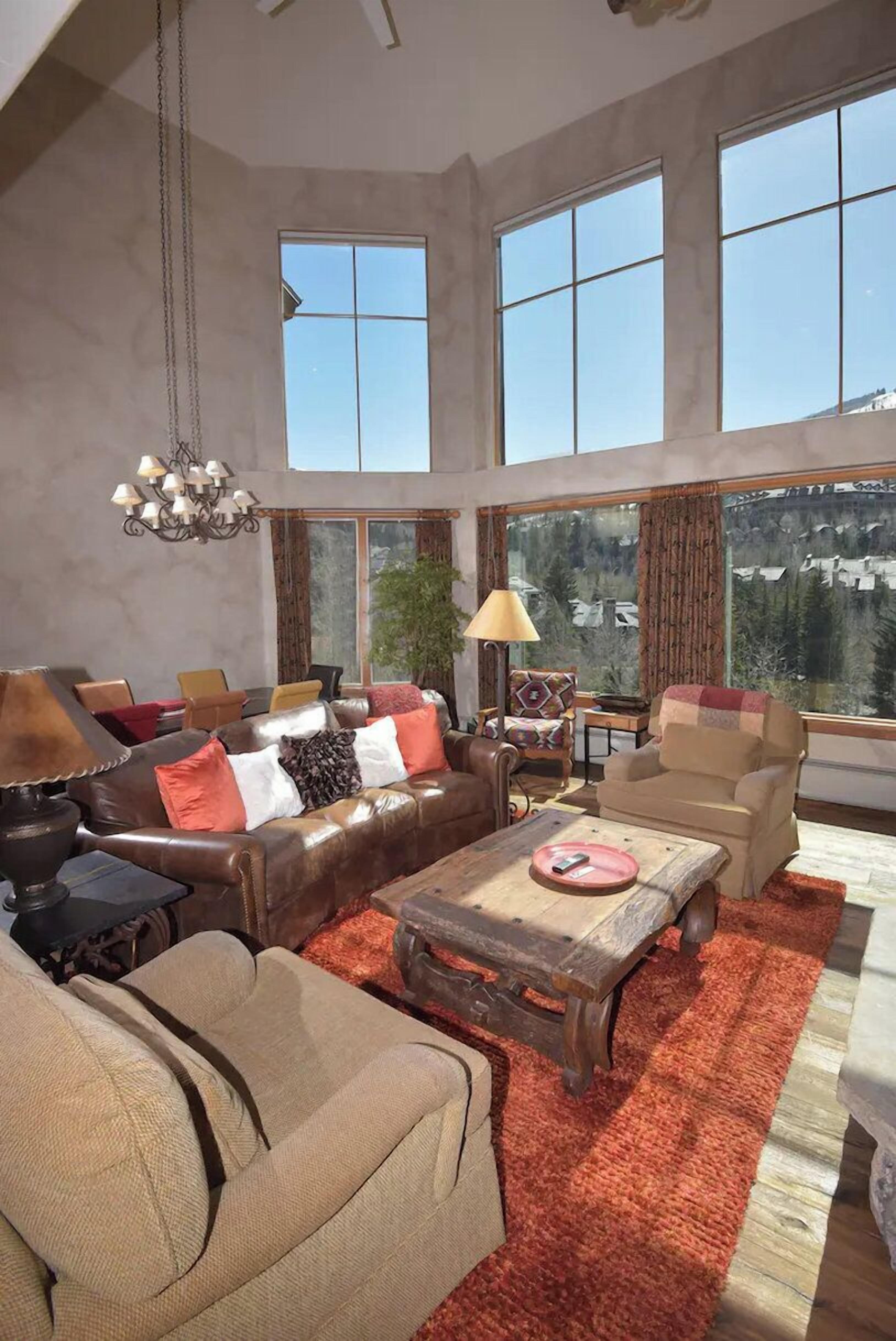 Condo, 4 Bedrooms (Loft & Den) | Living room | Flat-screen TV, fireplace