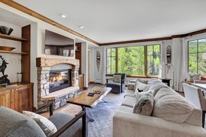 Premium Condo, 2 Bedrooms | Living area | Flat-screen TV, fireplace