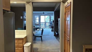 Room, 2 Bedrooms (+ Den) | Living area | 34-inch TV with cable channels, fireplace