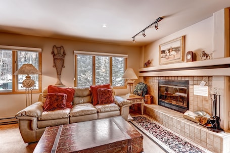 Condo, 1 Bedroom | Living room | TV, fireplace