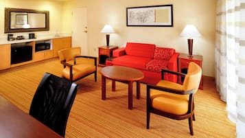 Suite, 1 Bedroom | Desk, blackout drapes, iron/ironing board, free WiFi