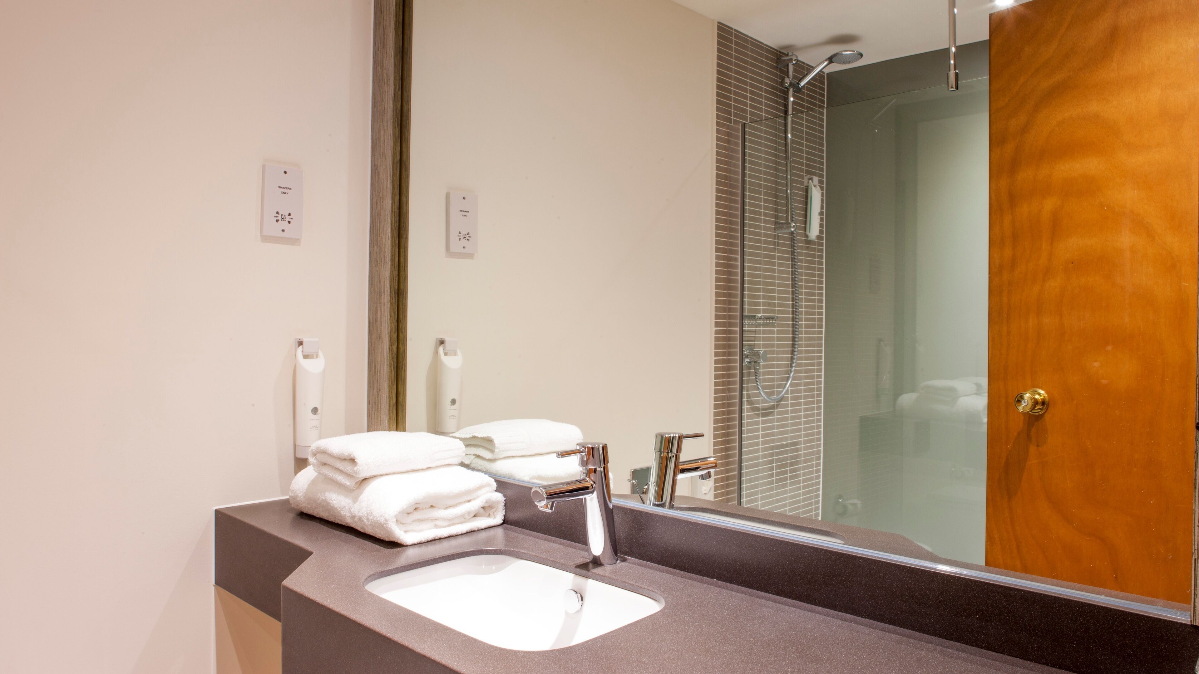 hair dryer, towels, soap, shampoo