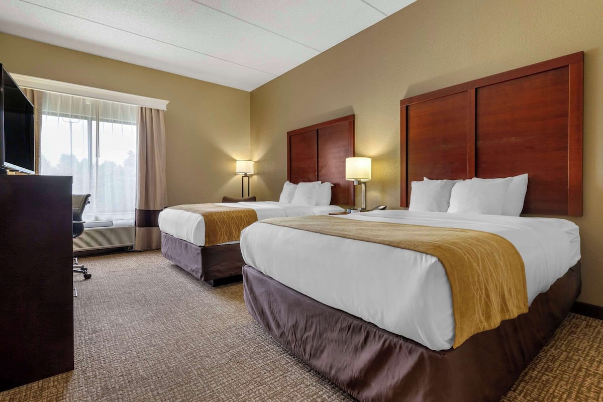 Premium bedding, desk, iron/ironing board, rollaway beds