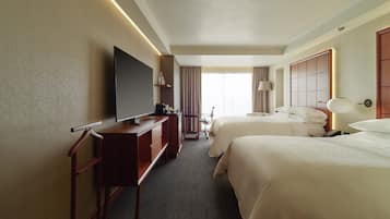 Premium bedding, down comforters, minibar, in-room safe