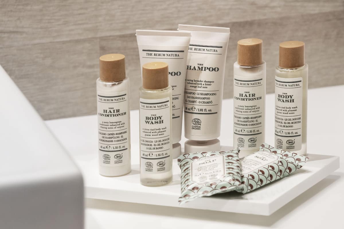 bathtub, free toiletries, hair dryer, towels