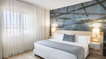Premium bedding, down duvets, memory-foam beds, minibar