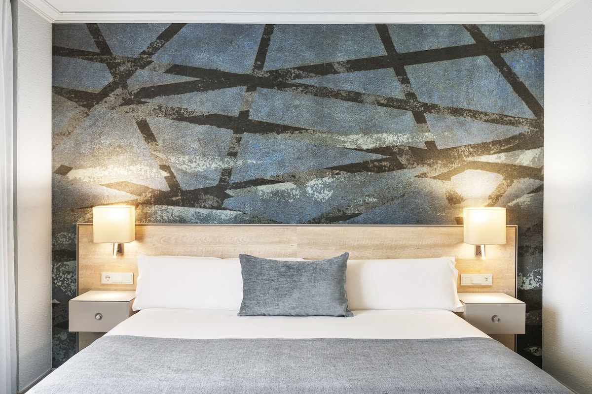 premium bedding, down duvets, memory-foam beds, minibar