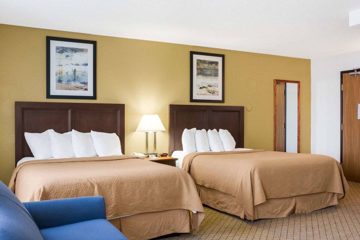 pillow-top beds, desk, laptop workspace, iron/ironing board