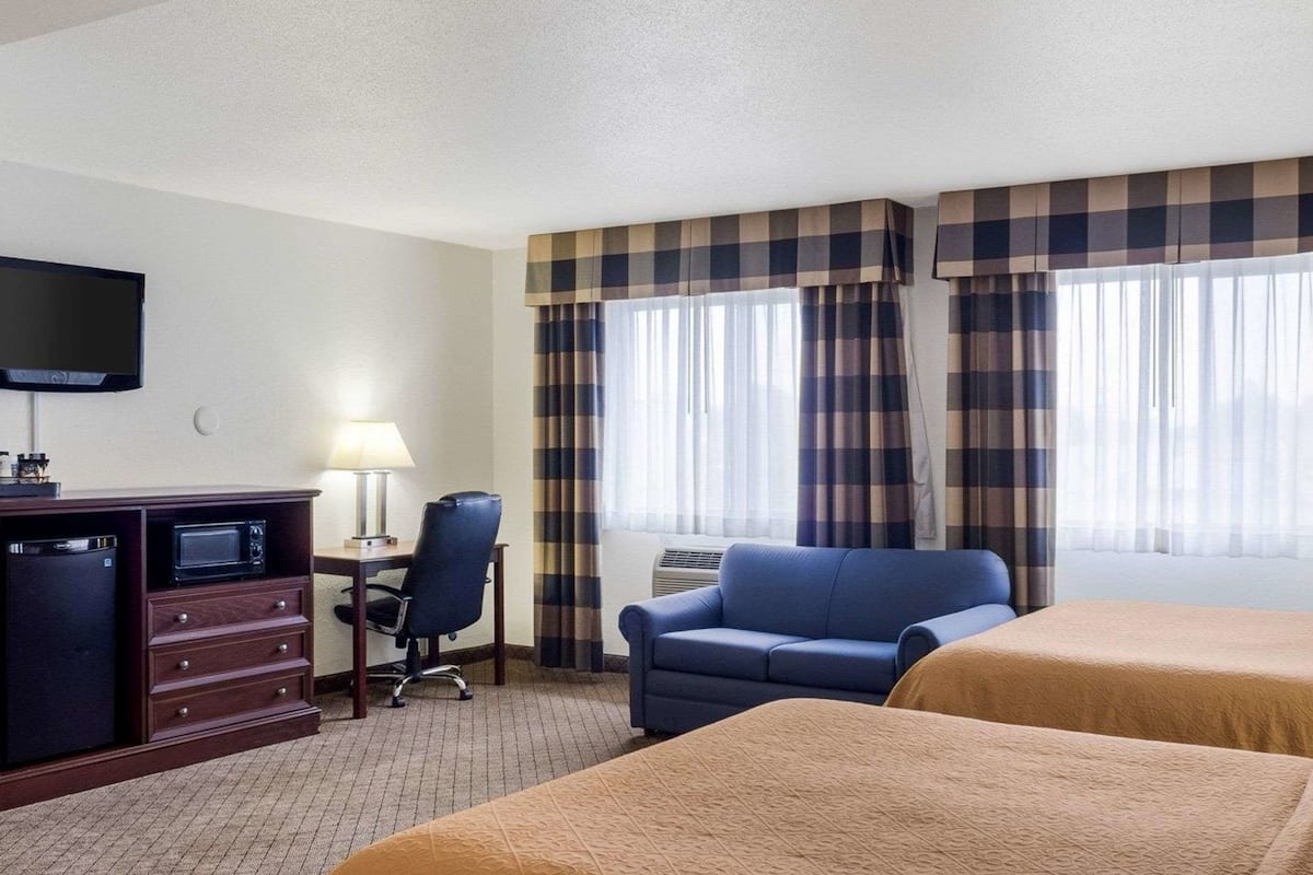 pillow-top beds, desk, laptop workspace, iron/ironing board