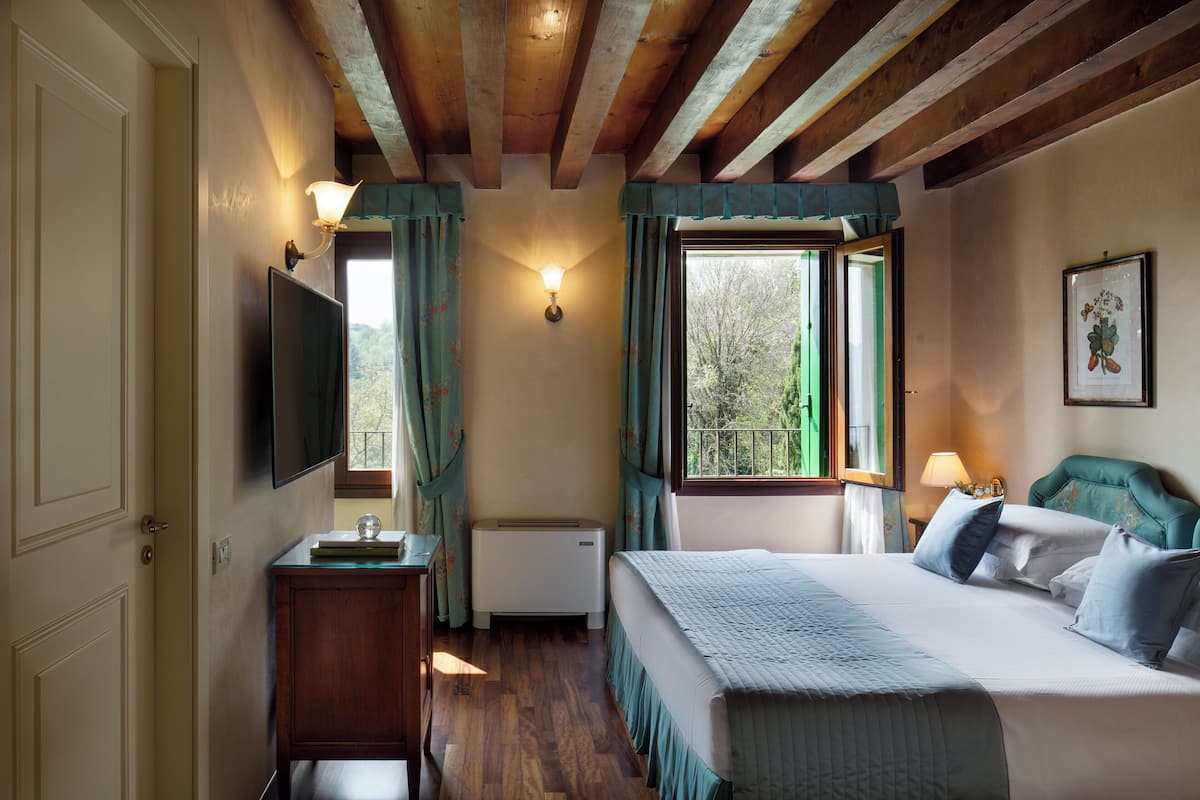 1 habitación, ropa de cama de alta calidad y minibar