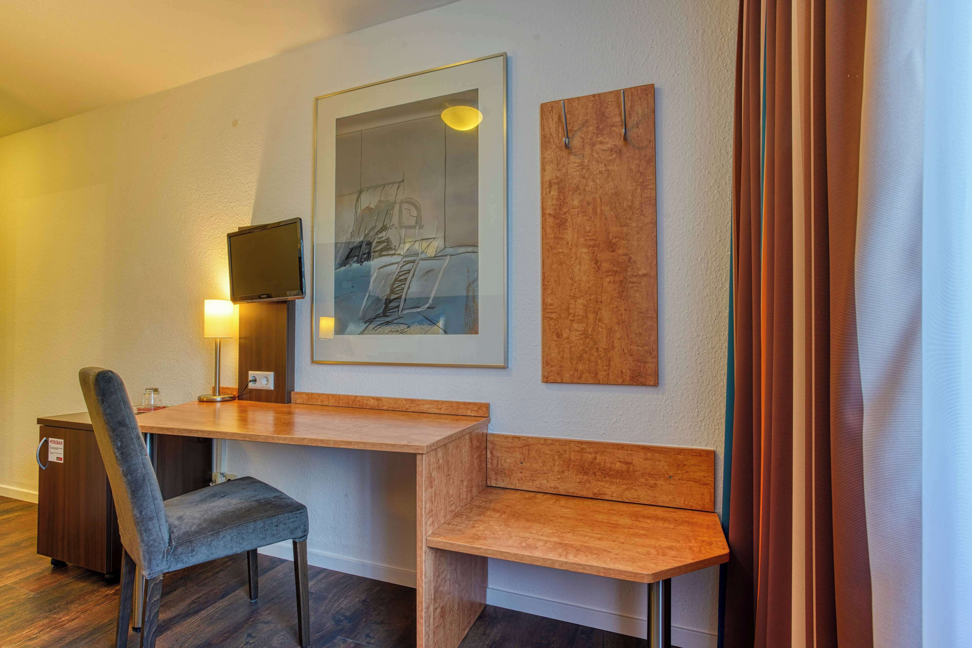 desk, blackout curtains, wifi, bed sheets