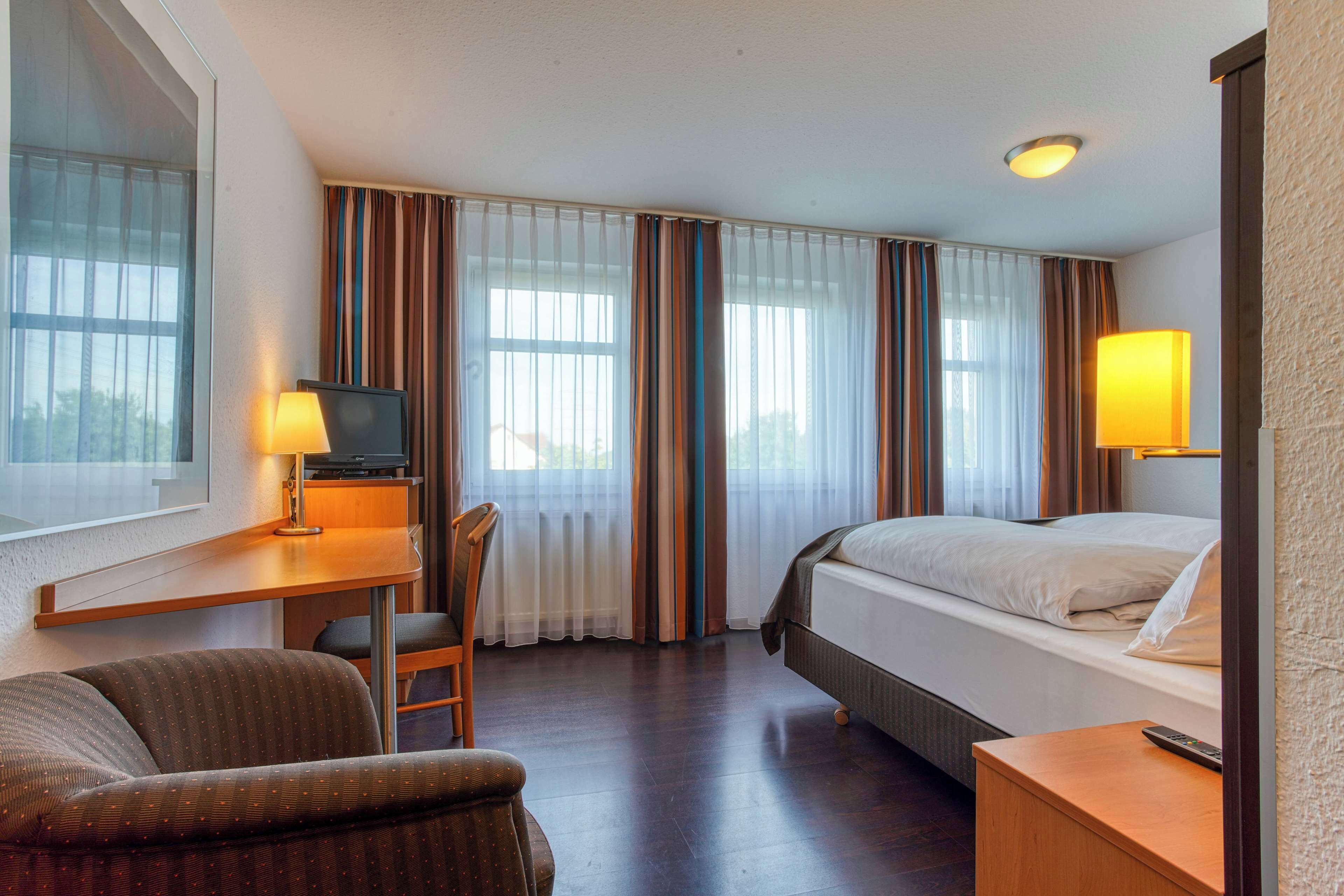 desk, blackout curtains, wifi, bed sheets