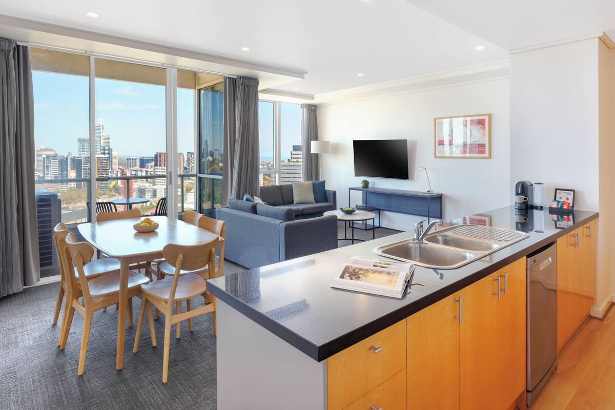 Deluxe Three Bedroom Two Bathroom Apartment | Living area
