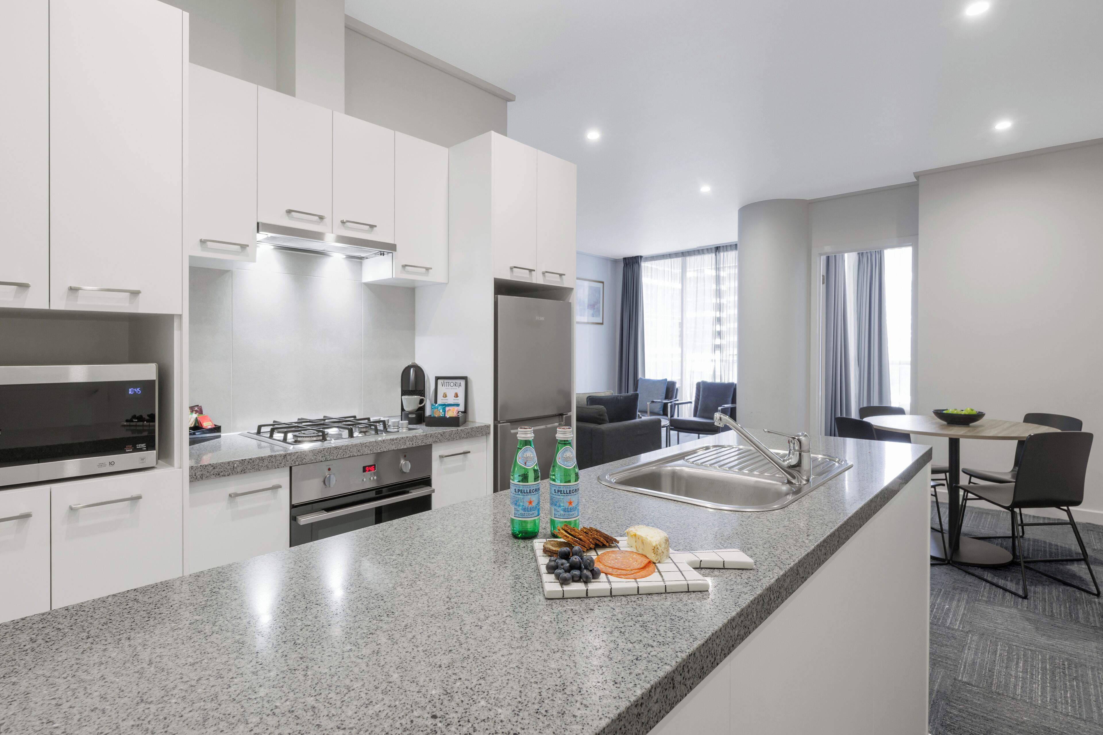 Two Bedroom Apartment | Private kitchen | Full-size fridge, microwave, oven, stovetop