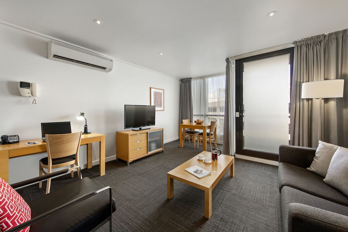 Executive One Bedroom Apartment | Living room | LED TV