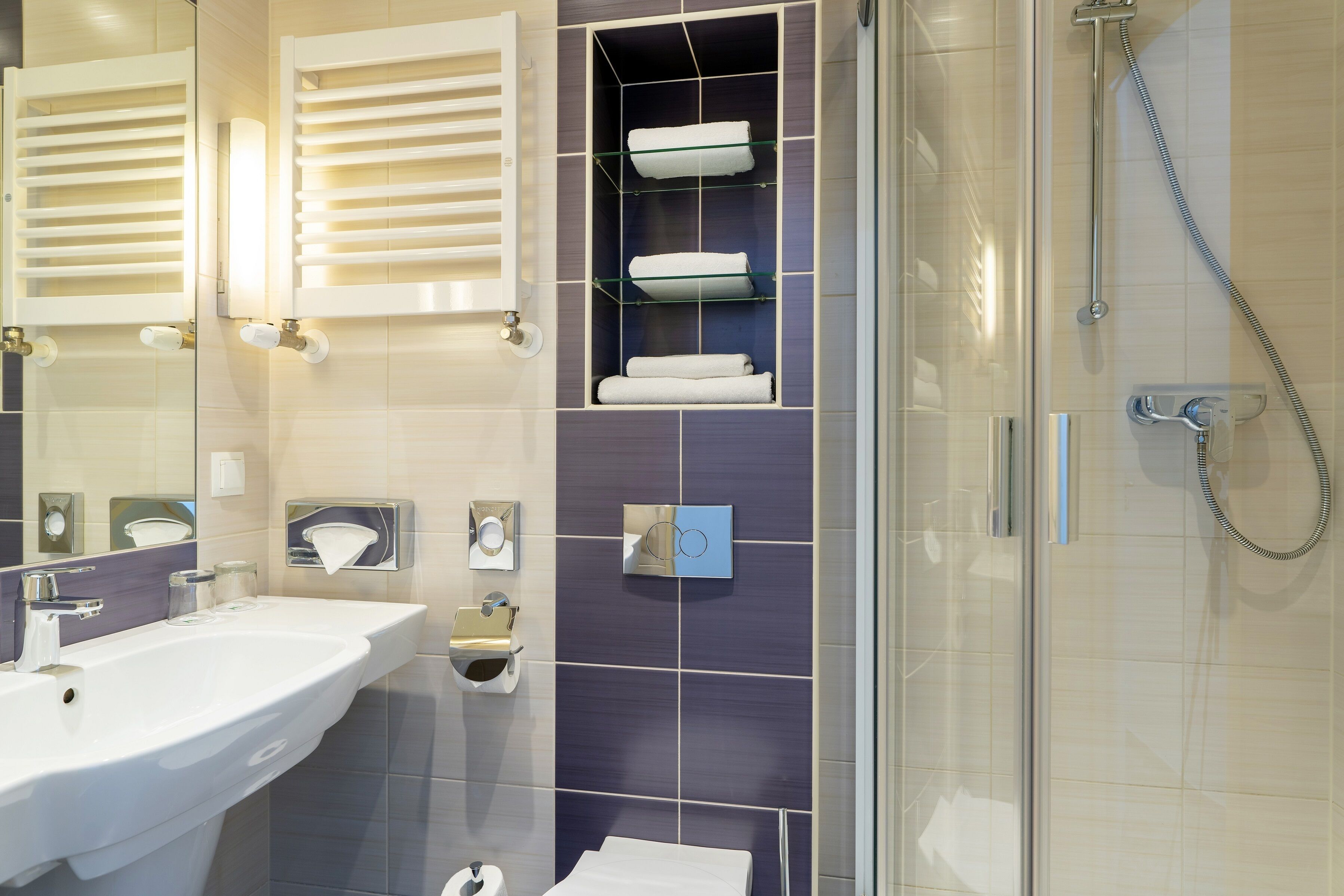 standard double room | bathroom | shower, hair dryer, towels, soap