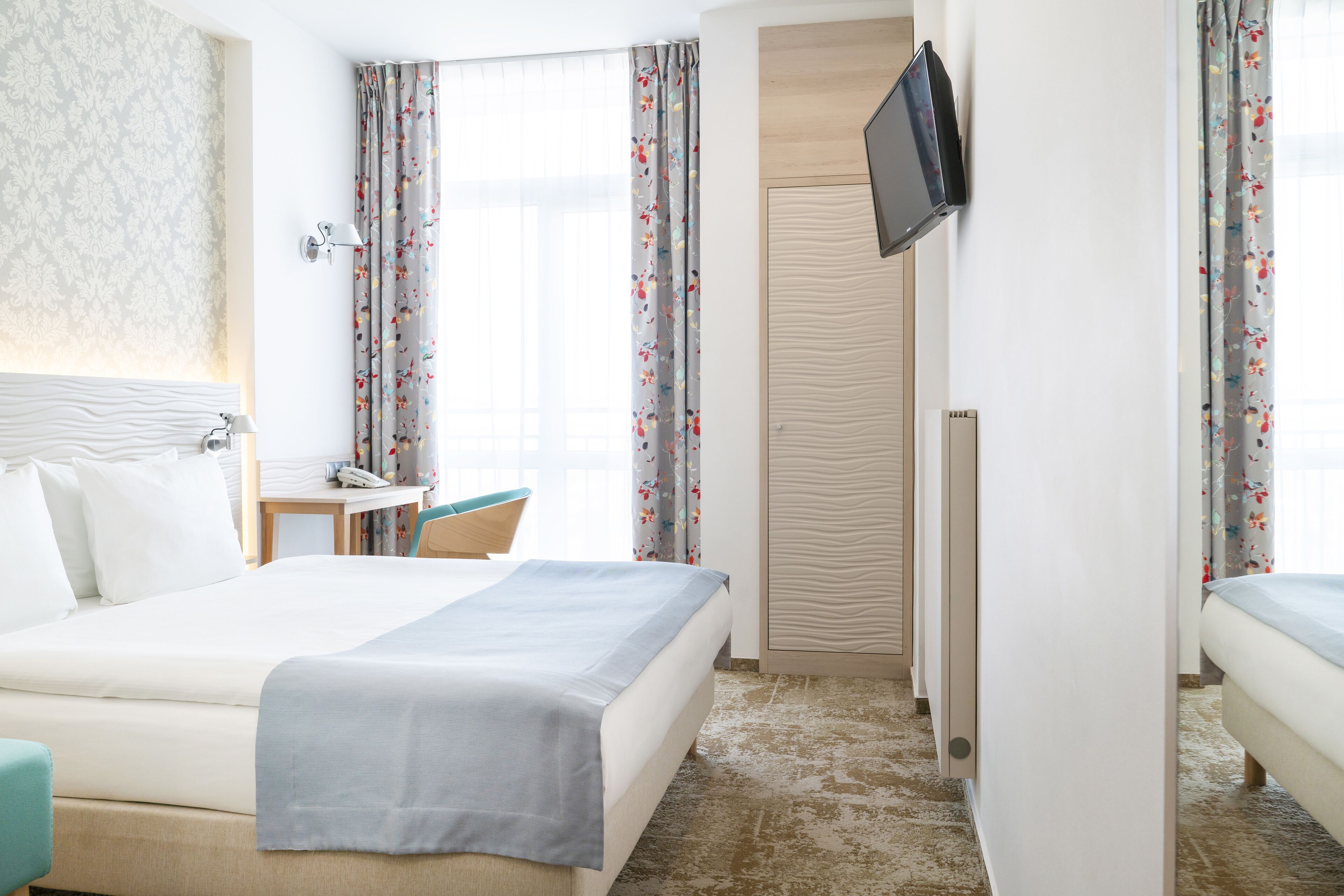 standard double room | in-room safe, desk, laptop workspace, blackout curtains