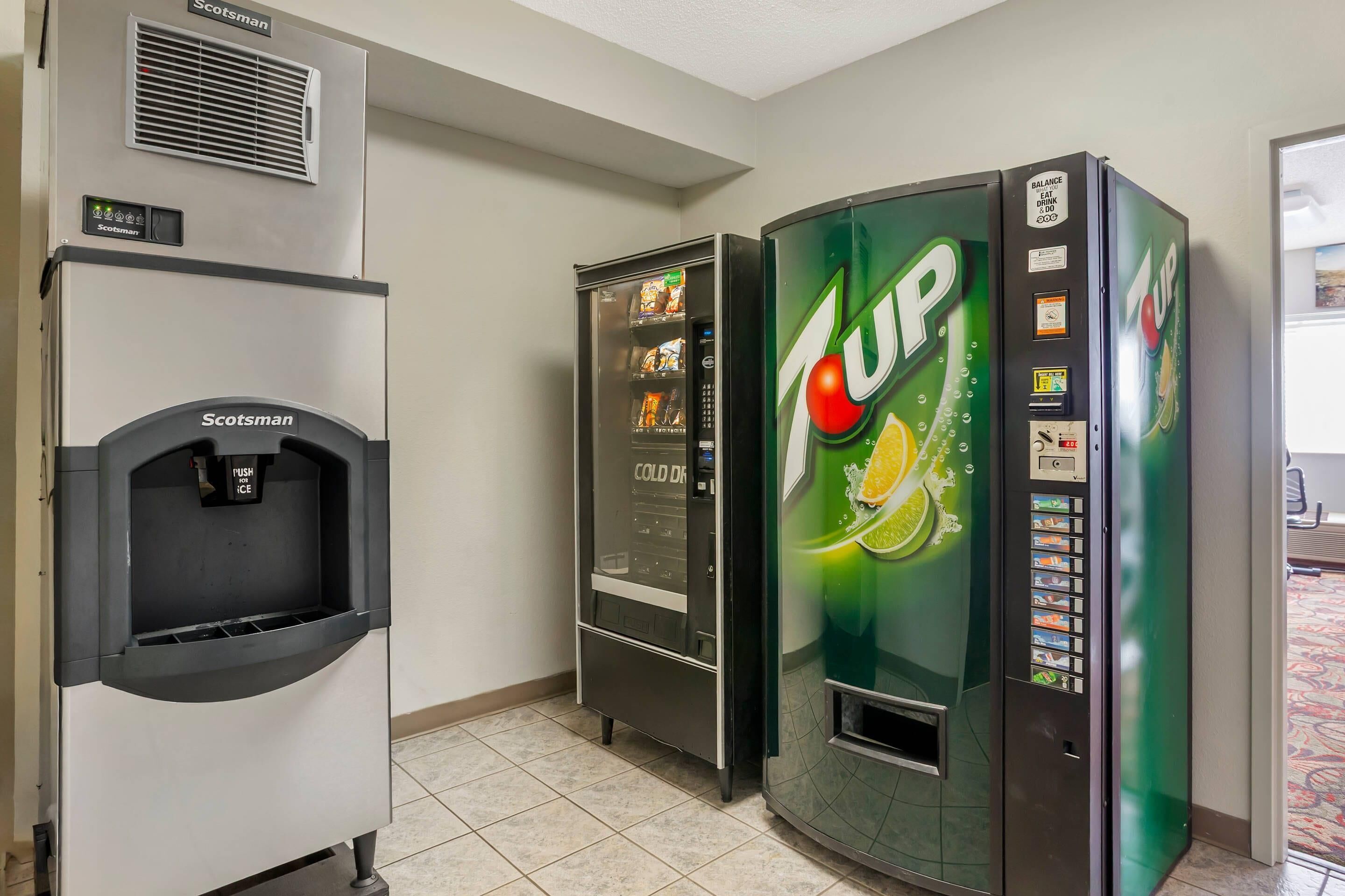 A vending machine area with a Scotsman ice dispenser and two 7UP vending machines.