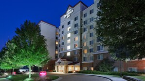 A Marriott Residence Inn with a brick facade, multiple windows, and an entrance sign. - Residence Inn by Marriott Charlotte SouthPark (Charlotte)