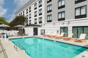 Seasonal outdoor pool, open 9:00 AM to 10:00 PM, pool umbrellas