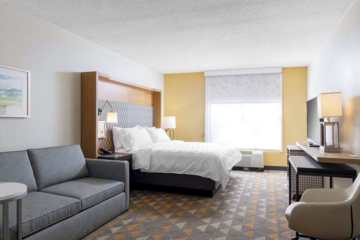 Premium bedding, down comforters, desk, laptop workspace