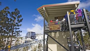 A ski lift station with a sign indicating it is managed by Resort Express.