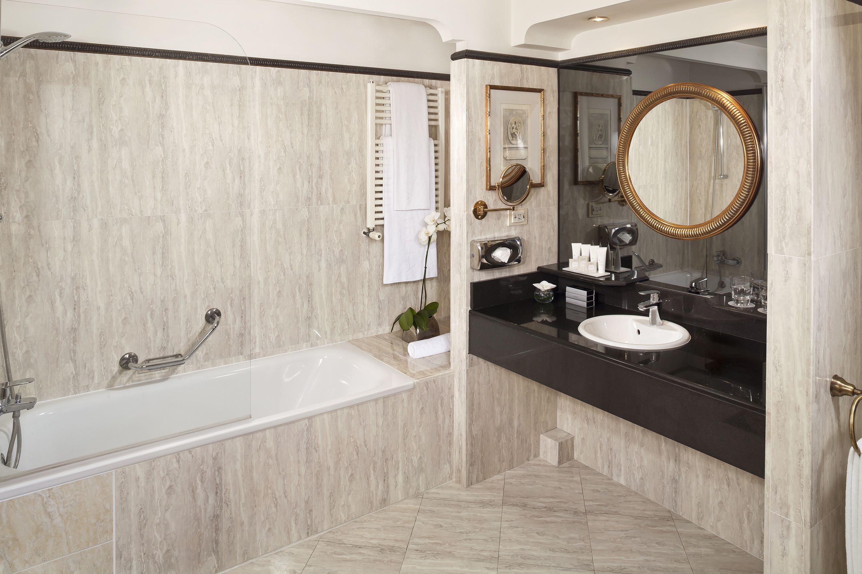 melia twin room | bathroom | combined shower/bathtub, deep-soaking bathtub, eco-friendly toiletries