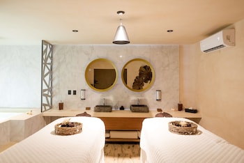 Sauna, body treatments, hot stone massages, deep-tissue massages at The Reef Playacar Beach Resort & Spa - Optional All Inclusive